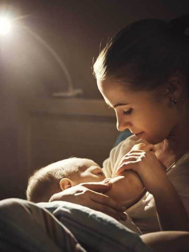 Breast-feeding.,Mother,Breastfeeds,The,Baby,In,The,Dark,In,Bed