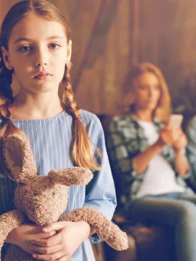 Ignored,Upset,Child,Posing,With,Her,Bunny,Toy