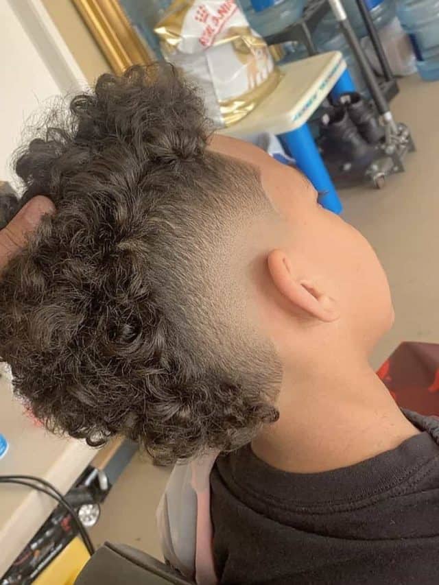 curly mohawk burst fade