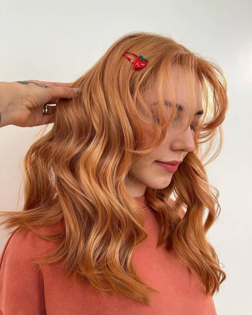 strawberry blonde hair style bangs curled
