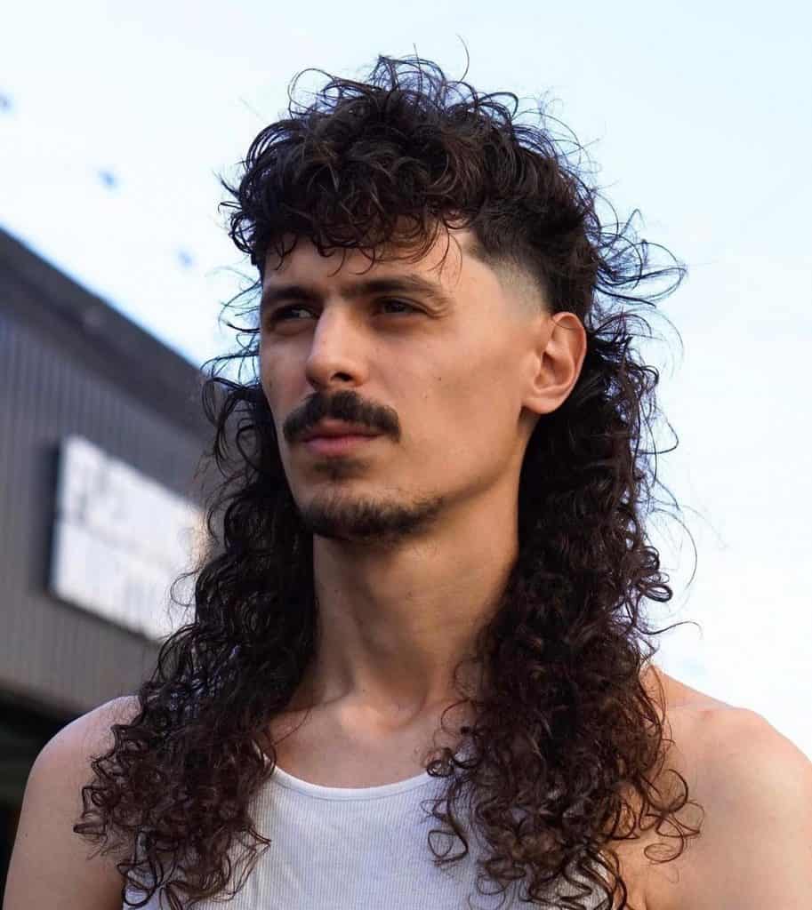 mullet hair long curly man