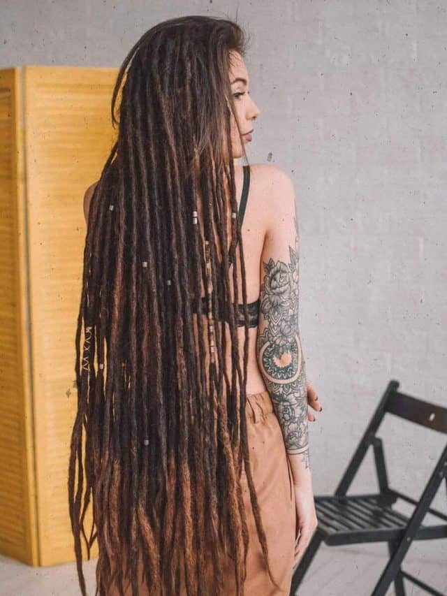 extra long hippy brunette dreads with beads