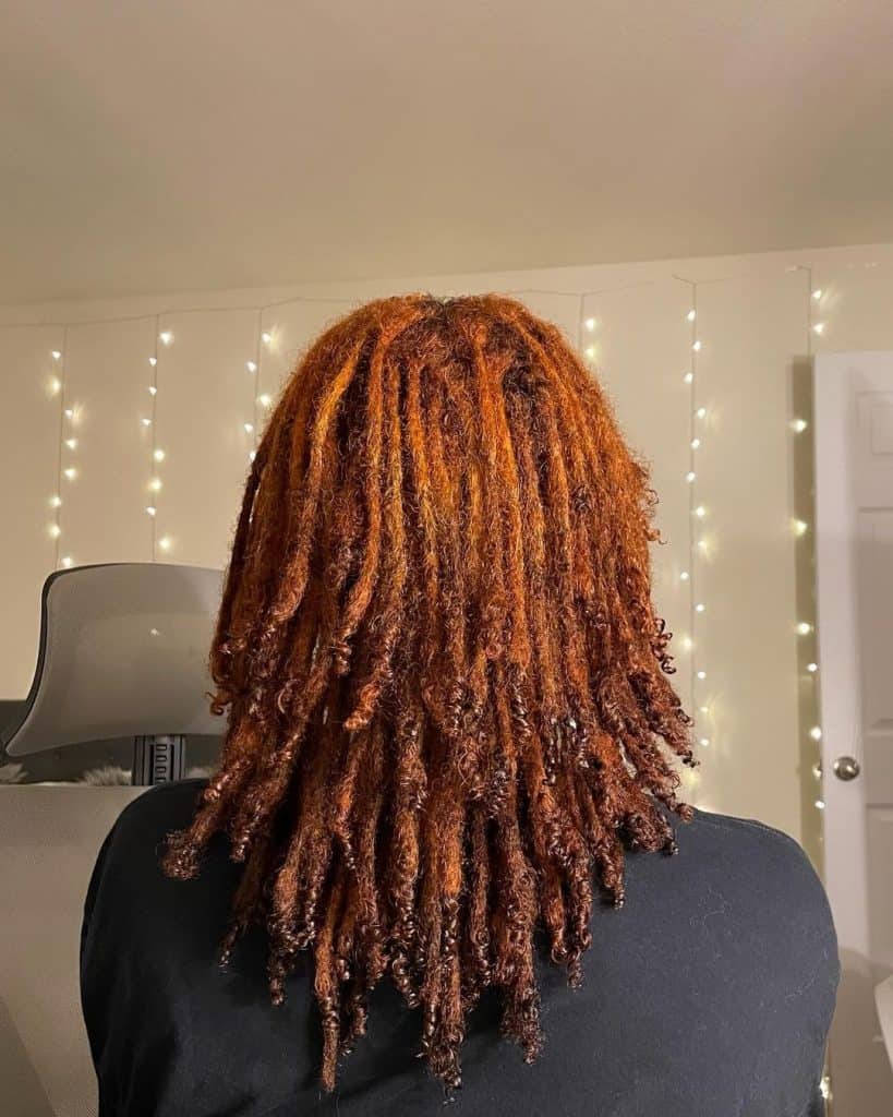 ginger short layered mid woman dreads locks