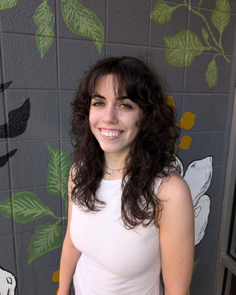 Long curly haired shag makes for a fun style! Cut by Molly •••#curlyshag #shag #shaghaircut #forestparkil (2)