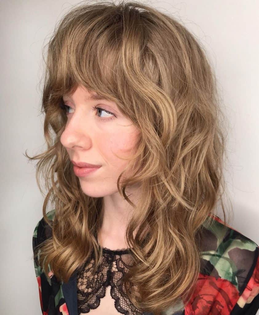 Michaela strolled in for a bang shaping two months after our first cut with her natural air dried texture looking as fresh as the day we shaped it I