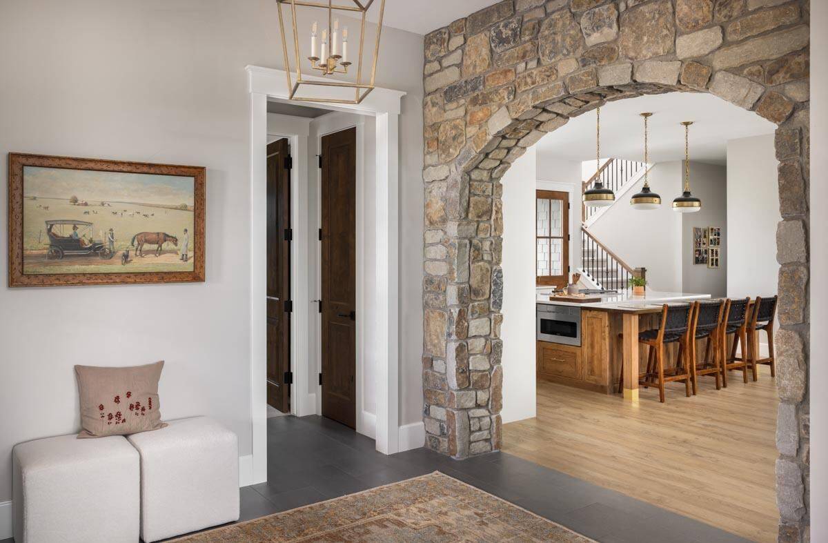 The foyer includes view of the kitchen.