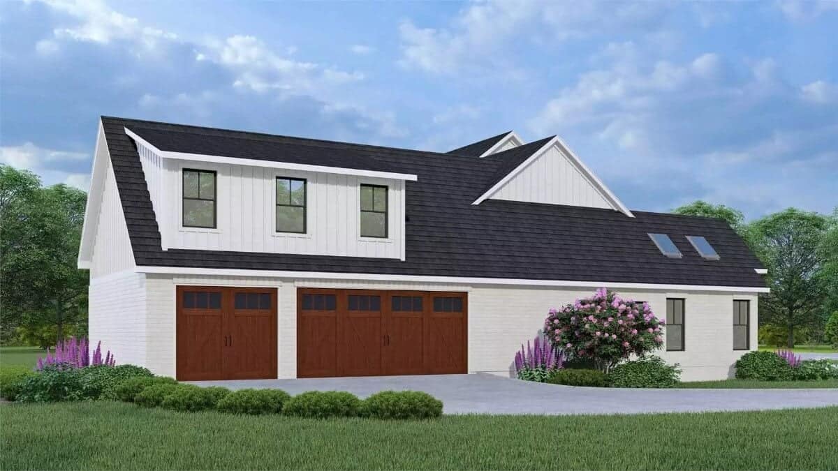 Left view with a 3-car garage topped by a large shed dormer.