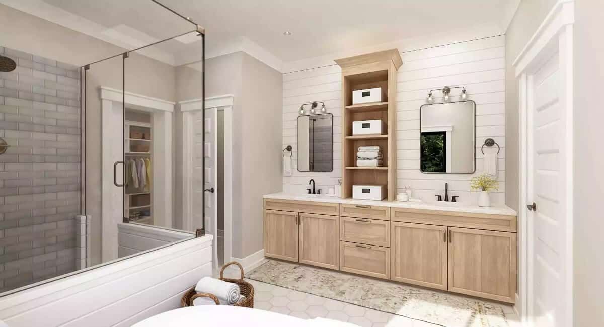 The primary bathroom includes a dual sink vanity topped by decorative mirrors.